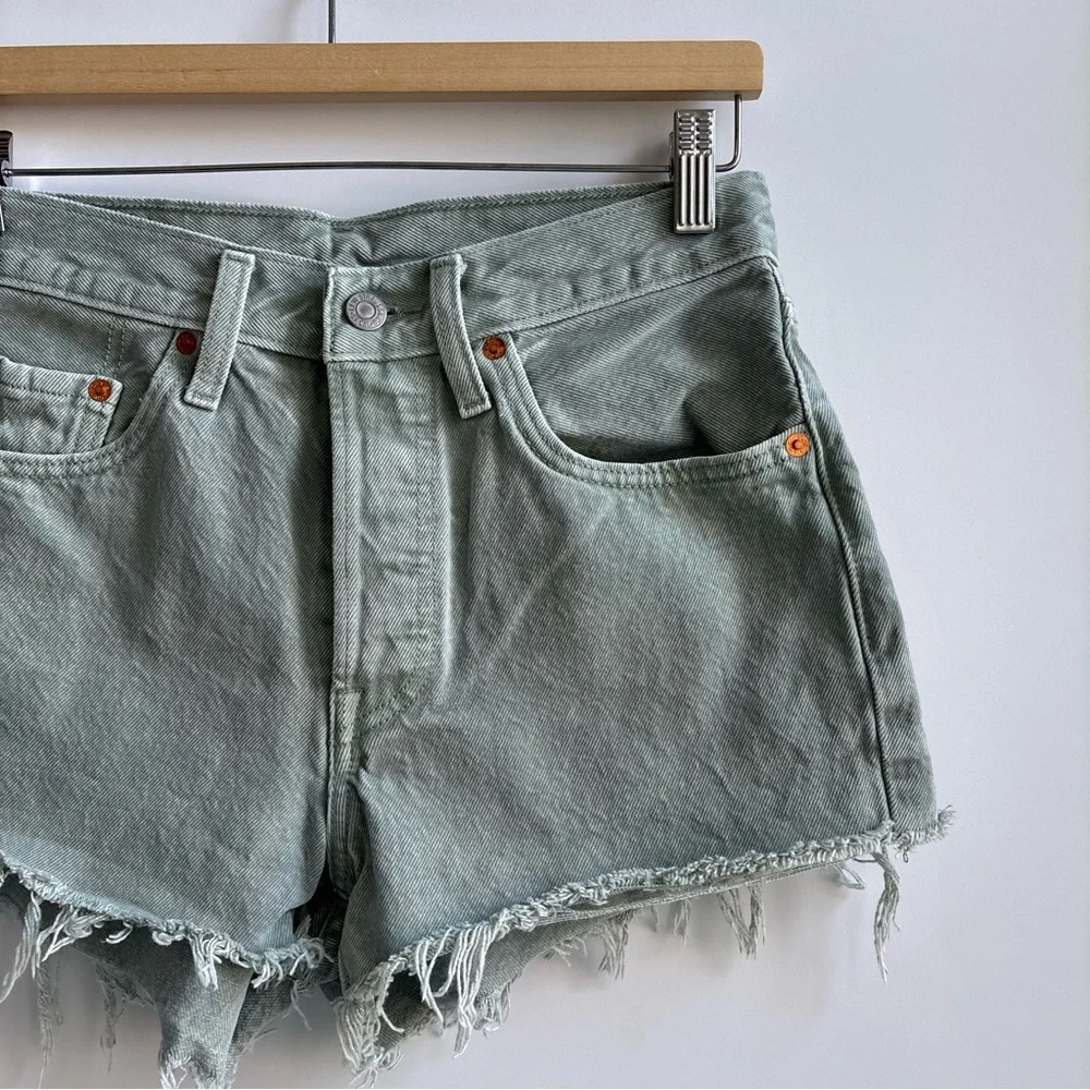 Levi’s Dusty Lily Pad Raw Hem Buttonfly Denim Jean Shorts Olive Green Size 27